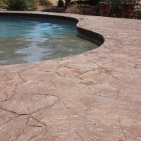 Copy of exterior-stamped-concrete-stain-and-seal-pool-deck-closeup